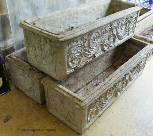 A set of three reconstituted stone rectangular garden plante...