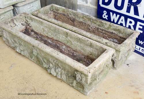 A pair of rectangular reconstituted stone garden planters. W...