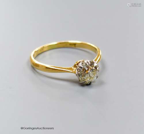 An 18ct and solitaire diamond ring, size O, gross 2.3 grams.