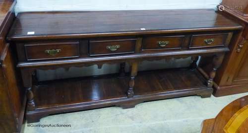 A reproduction 18th century style oak pot board low dresser....