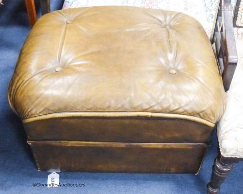 A tan leather footstool. W-58, H-36cm.