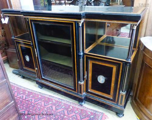 A late Victorian amboyna, banded ebonised break front side c...