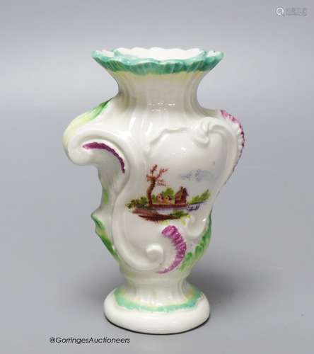 An 18th century Derby asymmetric vase painted with two lands...