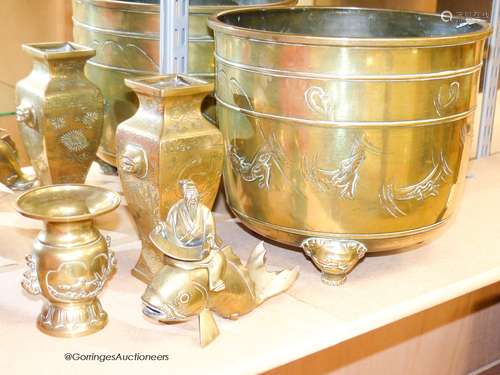 A Japanese brass planter, two vases and a model of kinko rid...