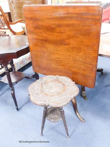 A mahogany tablet-top tripod table and carved occasional tab...