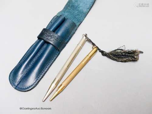 A 9ct gold propelling pencil and a Hukin and Heath silver pr...