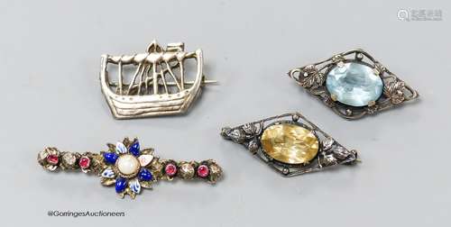 Two gem-set silver openwork lozenge-shaped brooches (possibl...