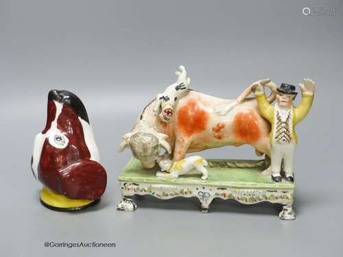 A 19th century Staffordshire bull baiting group, width 19cm,...