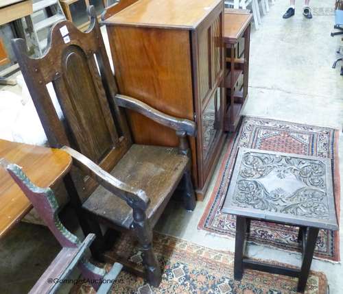 A 17th century style oak armchair and a square occasional ta...