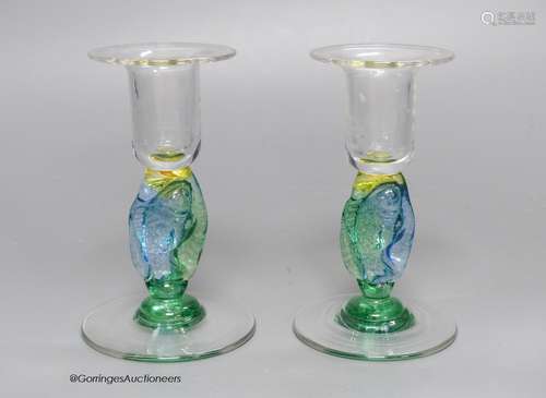 A pair of clear and coloured glass candlesticks by Helen Mil...