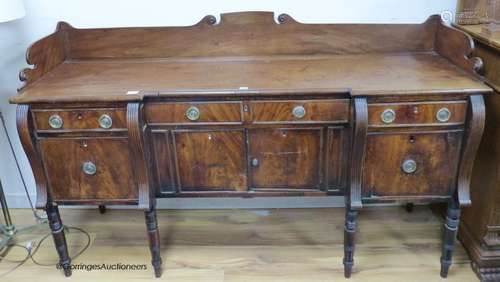 A Regency mahogany inverse breakfront sideboard. W-184, D-60...