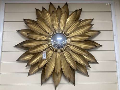 A contemporary gilt metal sunflower convex wall mirror. D-86...