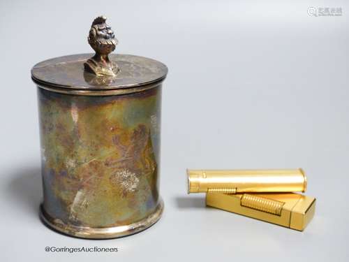 A silver plated caddy, 12cm, and two lighters