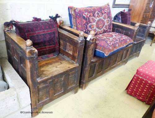 An Indian iron mounted, paneled hardwood hinged box seat ben...