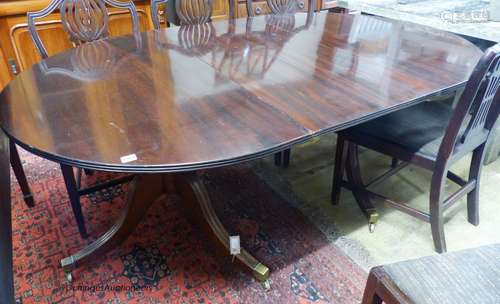 A mahogany two-pedestal dining table (one additional leaf) 1...