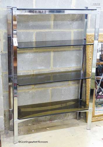 Merrow Associates, chrome and glass four tier shelving unit....