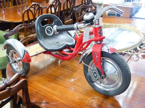 A child's Schwim tricycle.