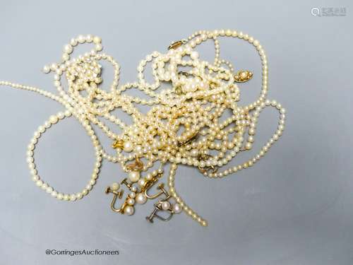 Four assorted single strand cultured pearl necklaces, a simi...