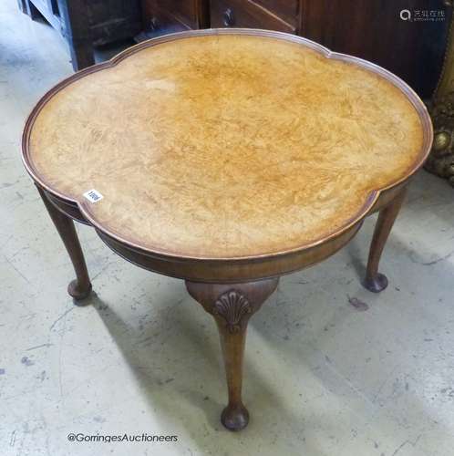 A queen and revival circular burr walnut coffee table. D-76,...