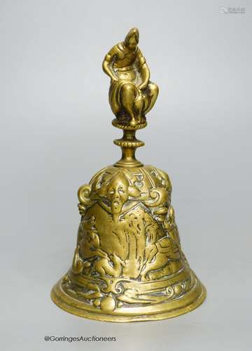 A French medieval style cast brass bell, 13cm high