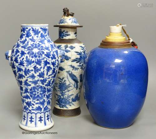 A 19th century Chinese blue and white vase, a similar crackl...