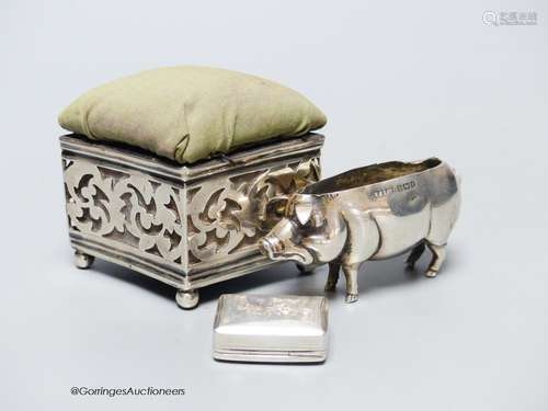 Two silver mounted pin cushions including a pig (lacking cus...