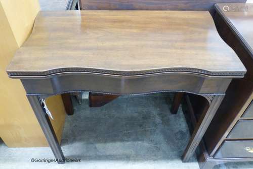 Georgian style serpentine mahogany folding top tea table. W-...