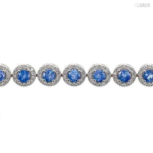 *Bracelet serti de tanzanites taille brillant entourées de p...