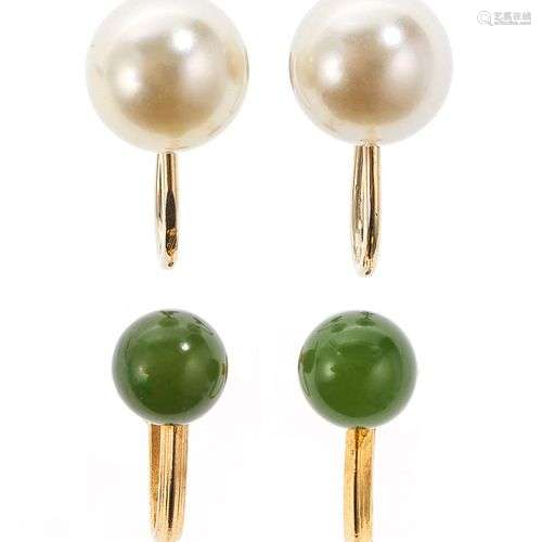 Boucles d'oreilles à système à vis serties d'une perle (D en...