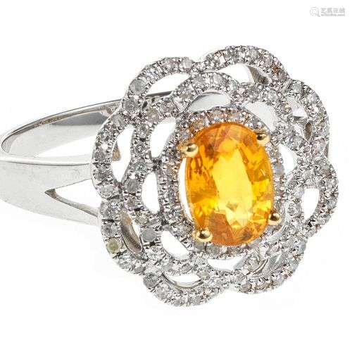 *Bague fleur sertie d'un saphir jaune taille ovale (env. 1 c...