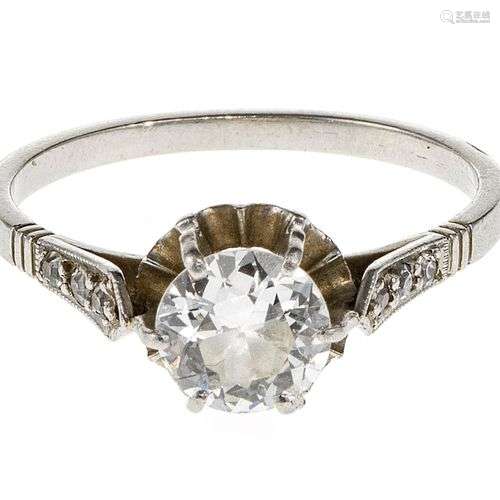 Bague solitaire sertie d'un diamant demi-taille sur châton i...