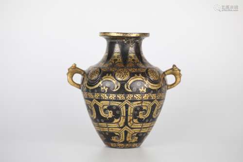 A long time ago a bottle with gold inlaid