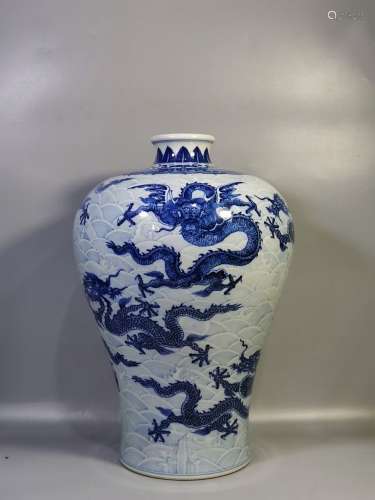 A QING DYNASTY QIANLONG  BLUE AND WHITE SEA WAVE DRAGON PLUM...