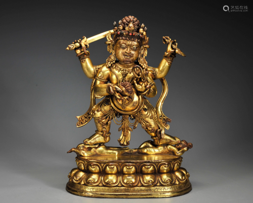 A Tibetan Gilt-bronze Standing Protector