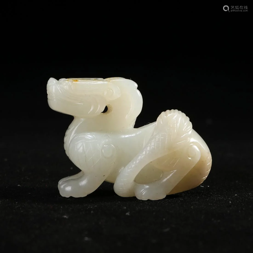 A WHITE JADE 'BEAST' CARVING