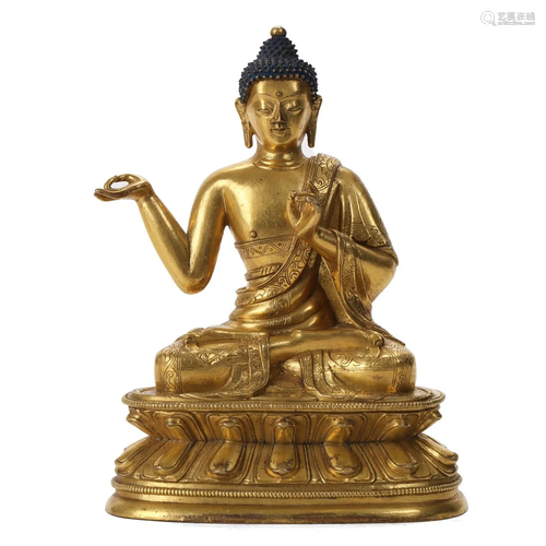 A GILT-BRONZE FIGURE OF SHAKYAMUNI