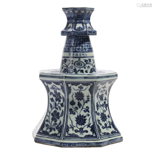 A BLUE AND WHITE 'LOTUS SCROLL' CANDLE HOLDER