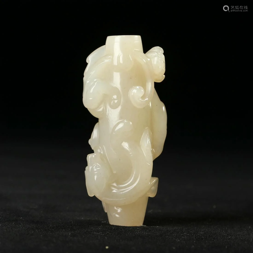 A WHITE JADE 'BEAST' PENDANT