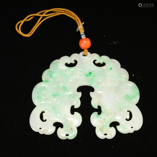 A JADEITE PENDANT