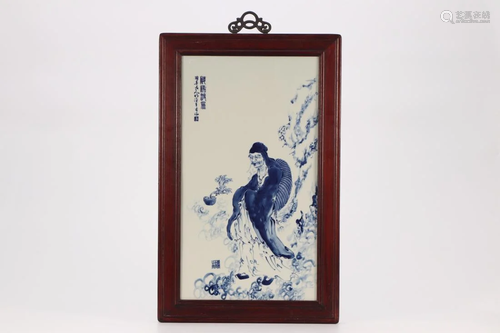 FRAMED BLUE AND WHITE FIGURAL PORCELAIN PLAQUE