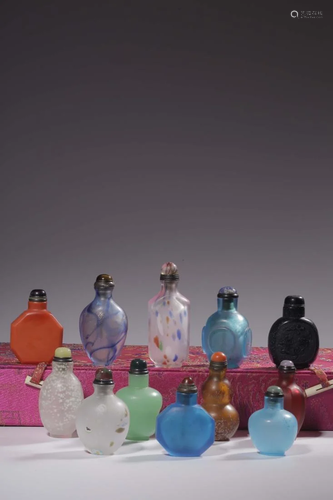 A SET OF TWELVE GLASS SNUFF BOTTLES