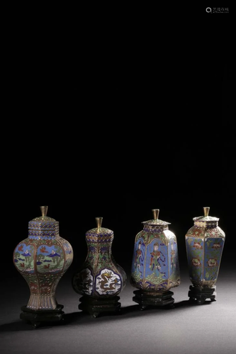 A SET OF FOUR ENAMELED LIDDED BRONZE VASES