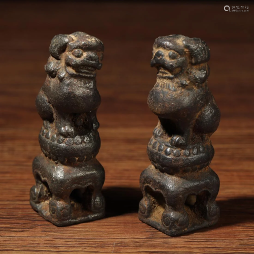 PAIR OF IRON CASTED LIONS