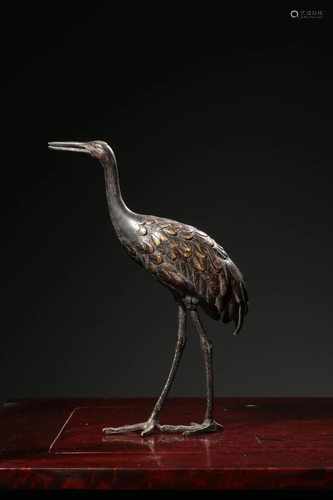 A GILT BRONZE CRANE