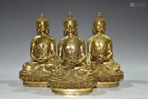 Three Chinese Gilt Metal Buddha