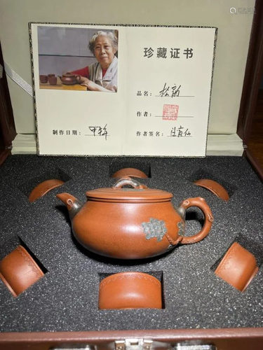 Chinese Zisha Teapot and Cup Set