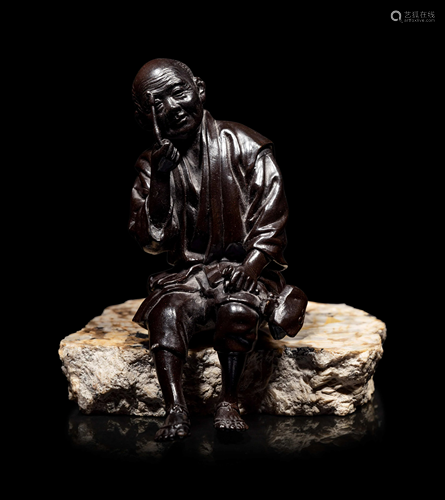 A Bronze Okimono of an Elderly Man