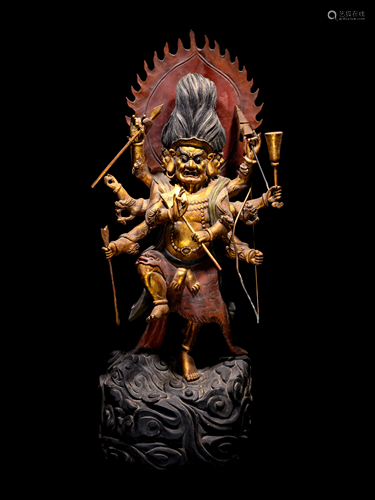 A Large Gilt and Red Lacquered Wood Figure of Mahakala