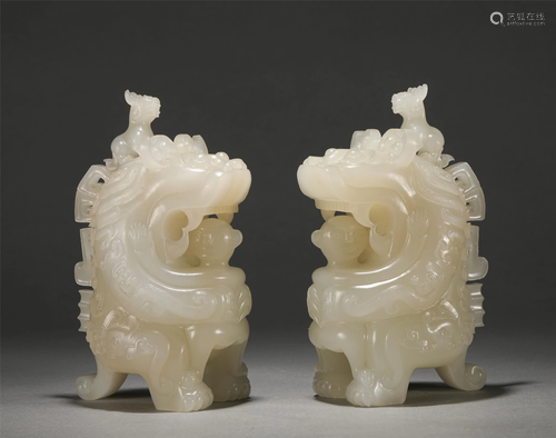 Pair of Chinese Carved White Jade Mythical Beasts