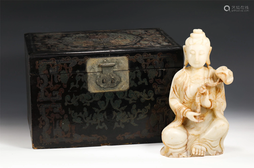 A Chinese Carved Jade Seated Avalokitesvara